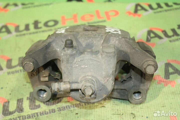 Суппорт nissan lafesta B30 передний левый