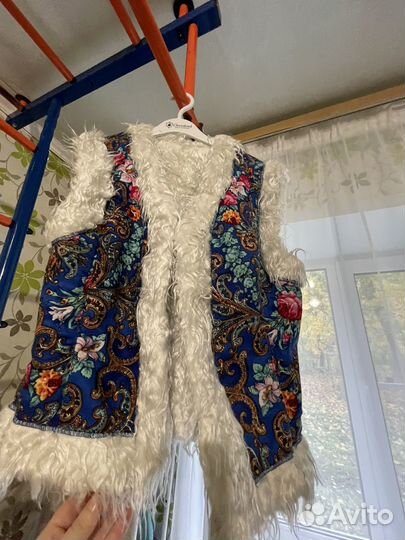 Жилет