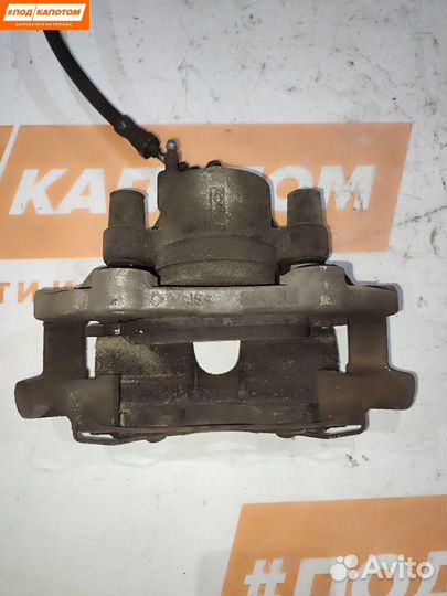 Суппорт тормозной передний левый Ford Focus