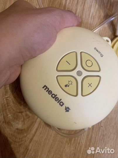 Молокоотсос medela электрический
