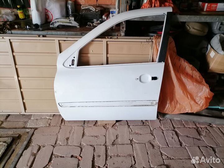 Дверь левая передняя granta