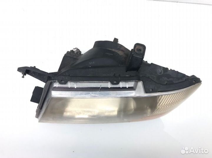 Фара левая Mitsubishi Pajero 3.2 DID 2005