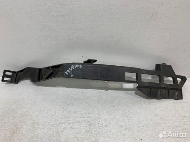 Кронштейн бампера передний правый Opel Astra J