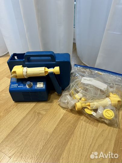 Молокоотсос medela lactina select