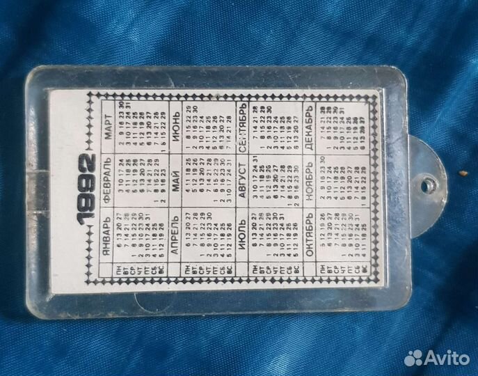 Брелок и календарь брюс ли 1992