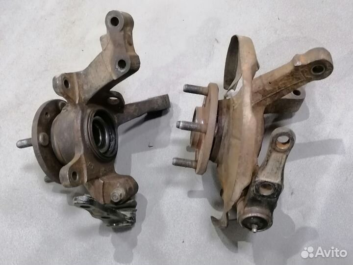 Кулак поворотный передний Kia Shuma 1996-2001