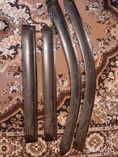 Дефлекторы окон