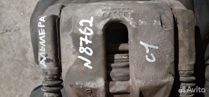 Суппорт тормозной передний левый Nissan Almera G15