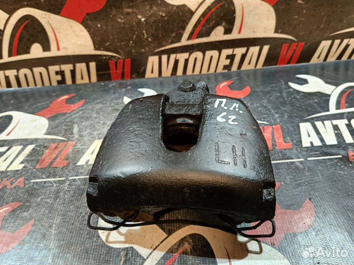 Суппорт тормозной передний левый Ford Focus 2