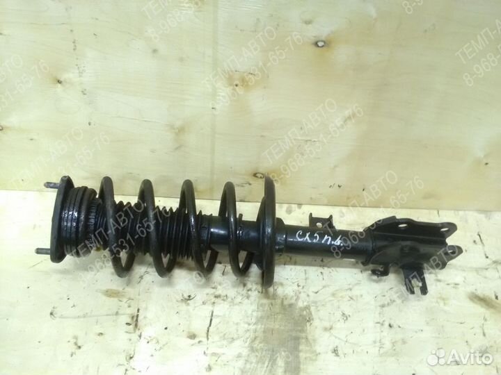 Стойка амортизатора передняя левая Mazda CX5 2011+