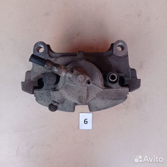 Суппорт тормозной передний правый VW Passat B6