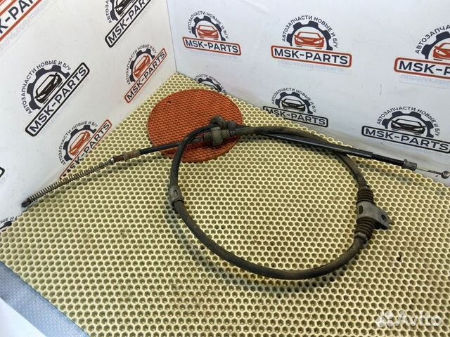 Трос стояночного тормоза правый Mitsubishi Lancer