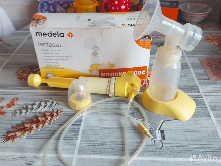 Молокоотсос medela ручной