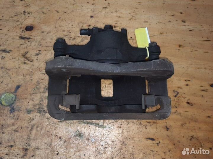 Суппорт передний левый Mitsubishi Lancer Cargo