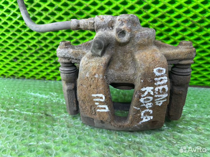 Суппорт тормозной передний правый Opel Corsa D