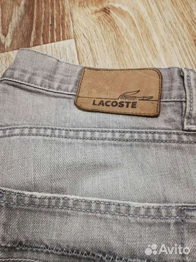 Джинсы Lacoste