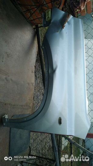 Левое крыло на ниссан х-трайл 2010