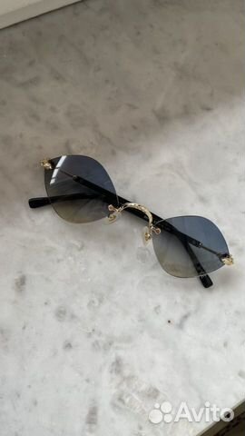 Солнечные очки женские