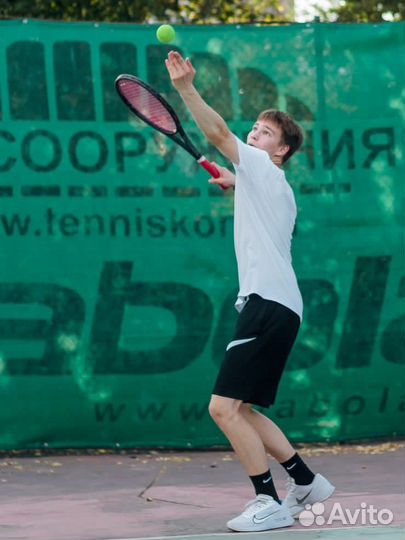 Тренер по большому теннису