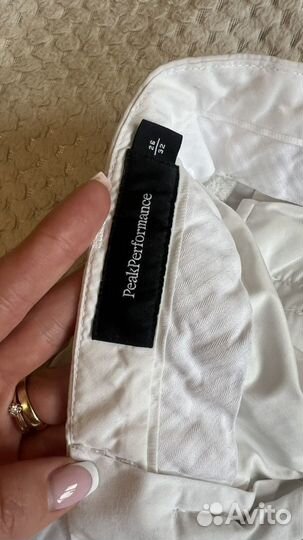 Белые брюки Peak Performance