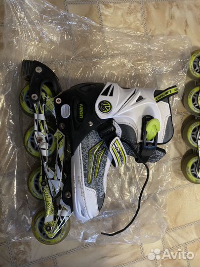 Роликовые коньки