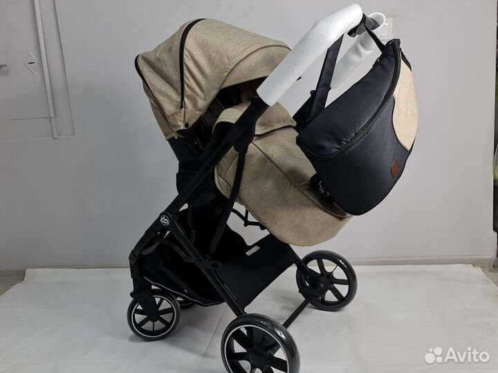 Коляска luxmom С реверсивным блоком