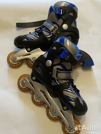 Роликовые коньки