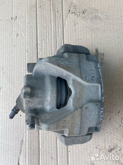 Суппорт тормозной передний Renault Fluence