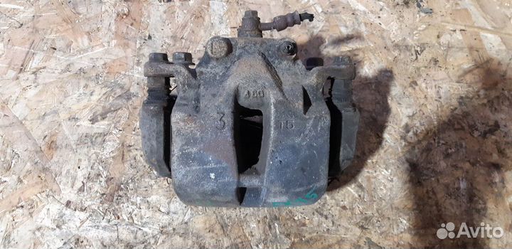 Суппорт тормозной передний левый Infiniti FX35 I р