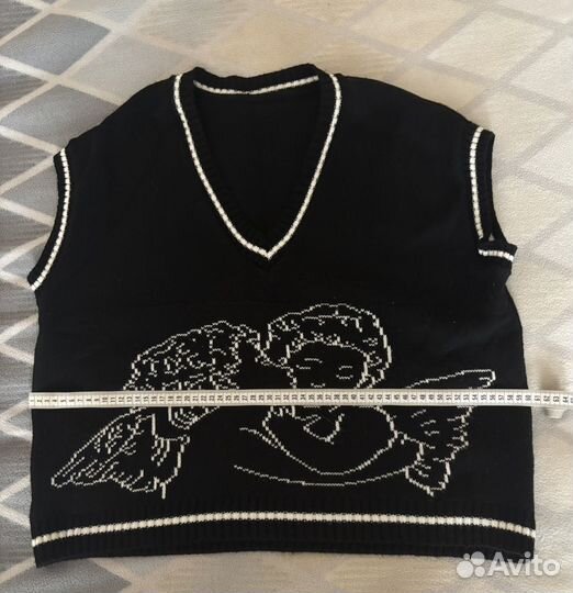 Жилетка женская вязаная