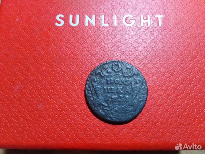 Полушка 1731 года. Перечекан с крестовой копейки