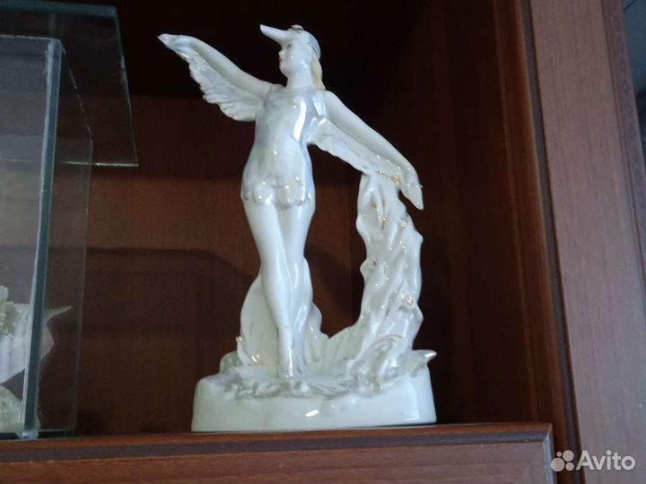 Статуэткаптица