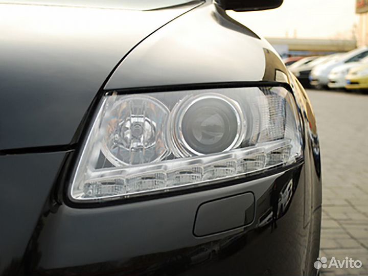 Стекло правой фары Audi A6 C6 2004-2011