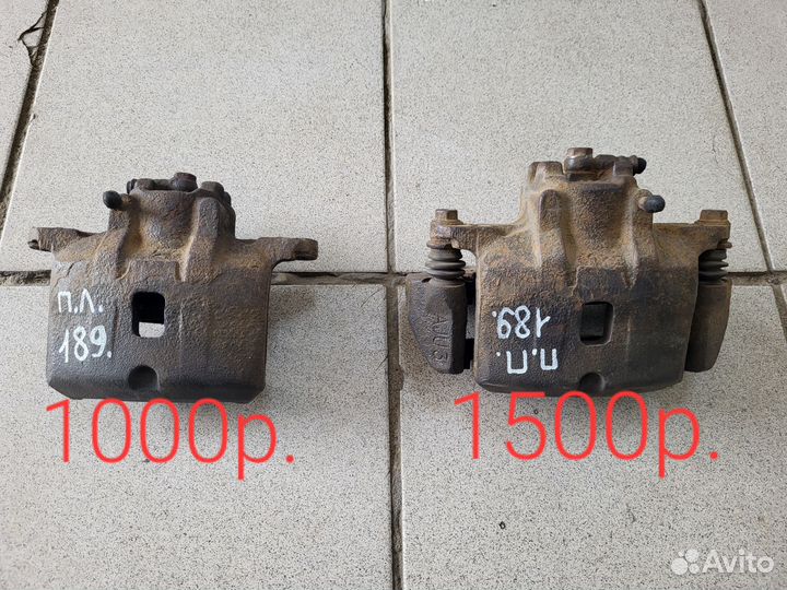 Суппорт тормозной передний Mitsubishi Lancer IX