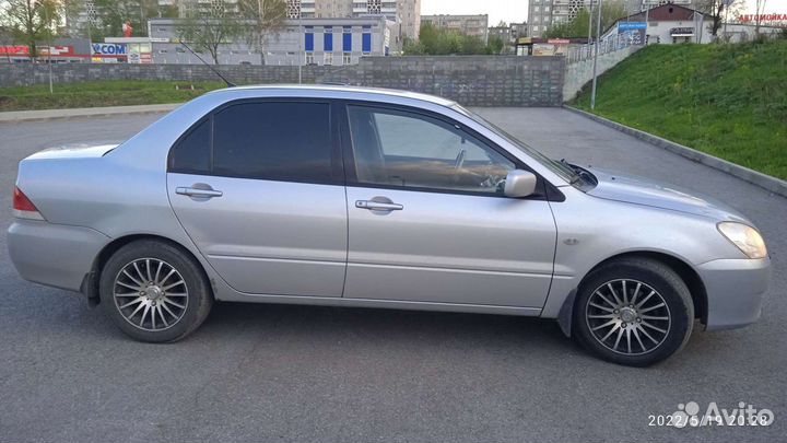 Mitsubishi Lancer 1.6 МТ, 2004, 309 000 км