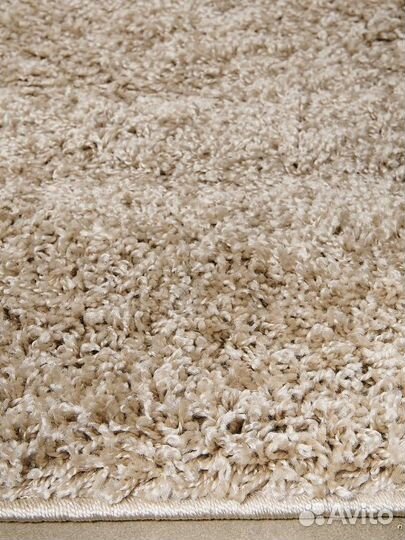 Ковер Лонж бежевый овал 1х2м