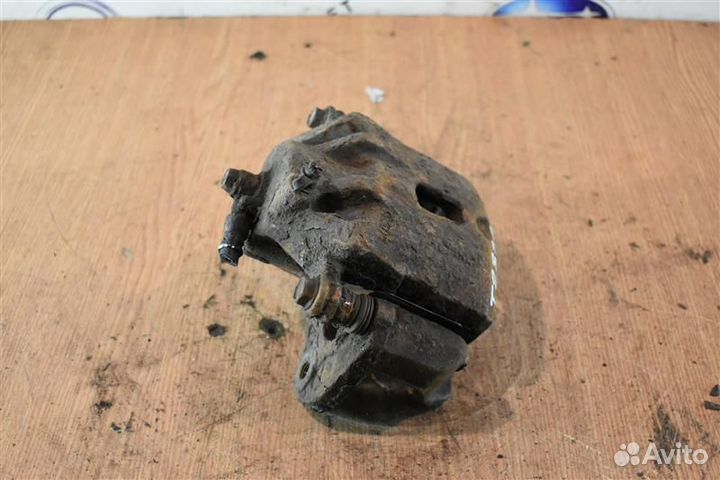 Суппорт тормозной передний правый Hyundai Tucson