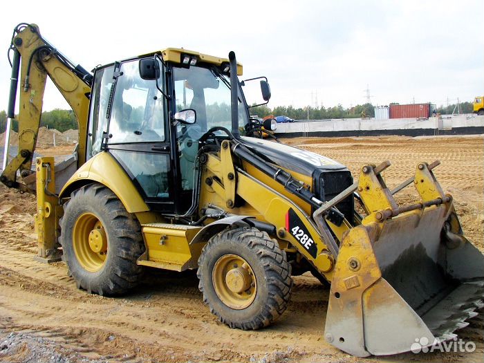 Услуги экскаватора погрузчика с гидромолотом