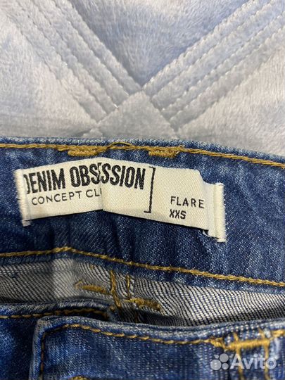 Джинсы клеш женские