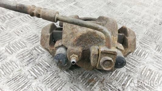 Суппорт тормозной задний левый jeep grand cherokee