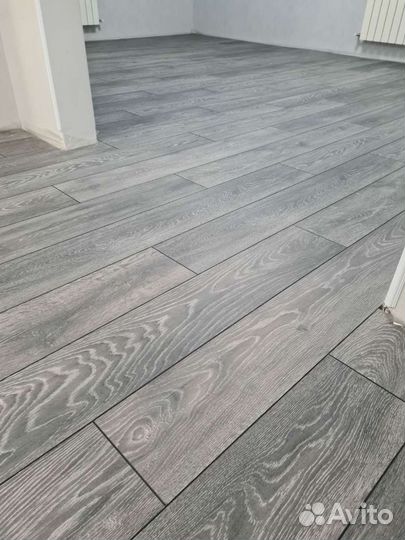 Укладка ламината, линолеума с установкой плинтуса