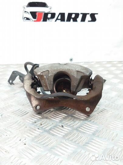 Суппорт тормозной передний Mitsubishi Lancer