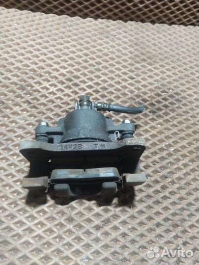 Суппорт тормозной передний правый Chevrolet Cruze