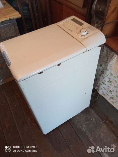 Стиральная машина с вертикальной загрузкой