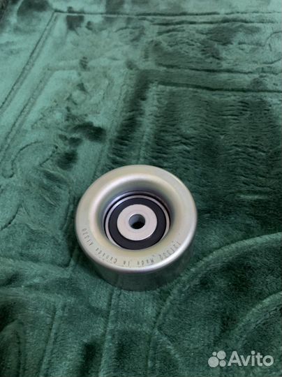 Натяжной ролик