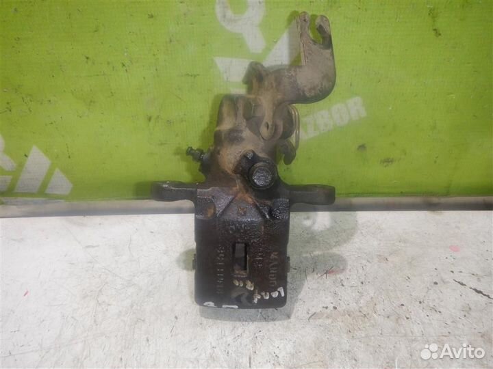 Суппорт задний правый Хендай Лантра 96-00