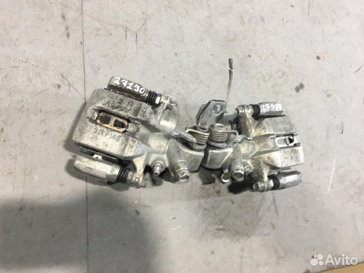 Суппорт задний правый honda civic 4d