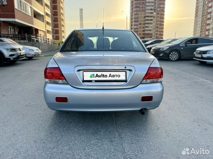 Mitsubishi Lancer 1.6 МТ, 2006, 285 710 км