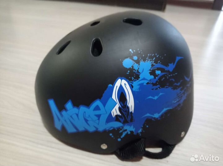 Роликовые коньки