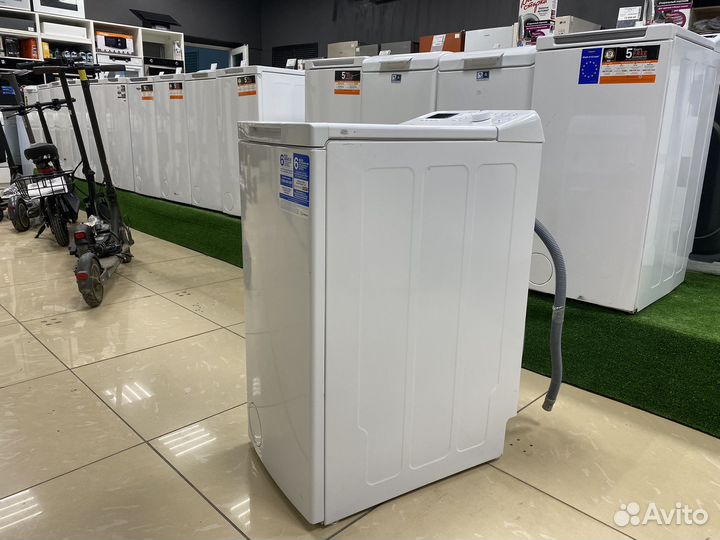 Стиральная машина с ветрикальной загрузкой